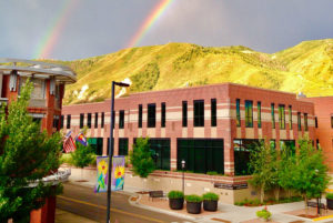 photo of the Morgridge Commons and a rainbow.