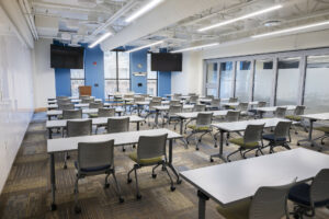 The Garfield 2 Room at Colorado Mountain College - Morgridge Commons, a large room full of chairs and desks.